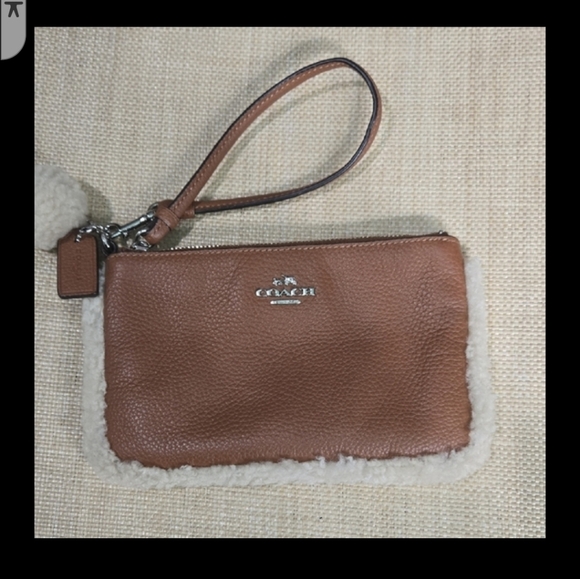 Coach Handbags - Coach Brown Leather Wristlet with Sherpa Shearling Trim